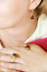 women's gold jewelry set of ring, earrings, pendant