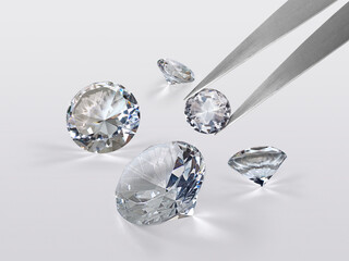 brilliant cut diamond held by tweezers