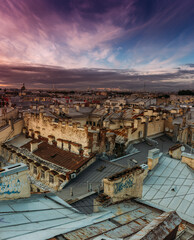 Fototapeta na wymiar Saint-Petersburg, Russia. Cityscape panorama of old city centre, view from a rooftop. Sunset