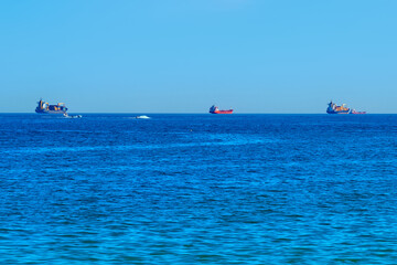 View of large commercial ships in the Mediterranean sea.