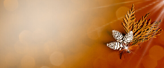 Happy New Year banner in Fortuna Gold color, background in color trend 2021. Coniferous twig and...