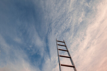 Staircase  against blue sky. Motivation business career growth concept