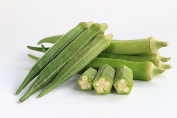 Fresh vegetable okra on white background.