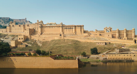 Fototapeta premium Amer Fort bathed in morning light in summer. Jaipur, India.