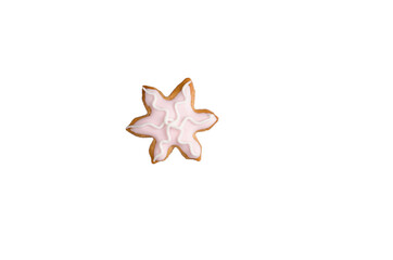 snowflake christmas honey gingerbread cookies homemade decorated with pink icing isolated on white background