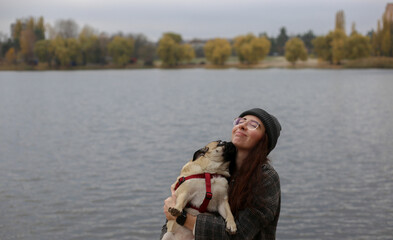 Joyful owner and dog interaction outdoors — mental health & happiness concept