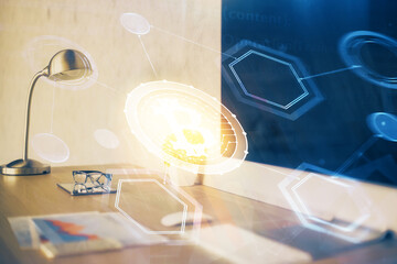 Multi exposure of blockchain and crypto economy theme hologram and table with computer background....