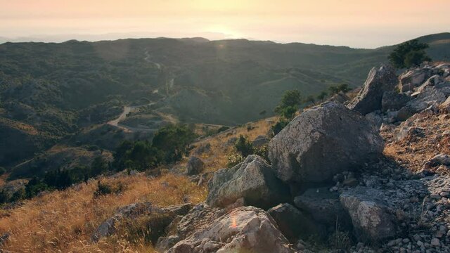 Sunset seen from Pantocrator mountain. Beautiful landscape of Corfu Mountains, Greece.