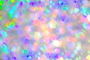 Blurred positive colorful festive background, round lens flares