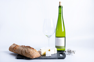 Wine bottle and two wine glasses. Wine bottle against a white background