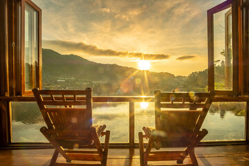 lake view at coffee shop in the morning sunrise, Ban Rak Thai village, landmark and popular for...