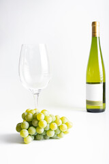 Bottle of wine and glass on isolated on white