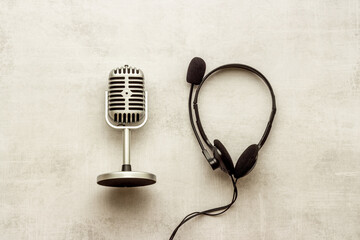 Studio microphone and headphones, top view. Recording podcast and streaming concept