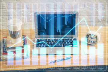 Multi exposure of graph and financial info and work space with computer background. Concept of international online trading.