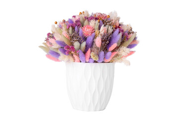 Mixed colorful dry flower bouquet in pink and violet colors in vase. Modern style in the interior.