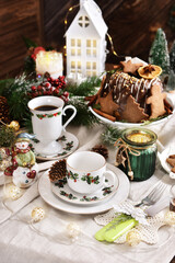 Christmas table setting in white red green colors