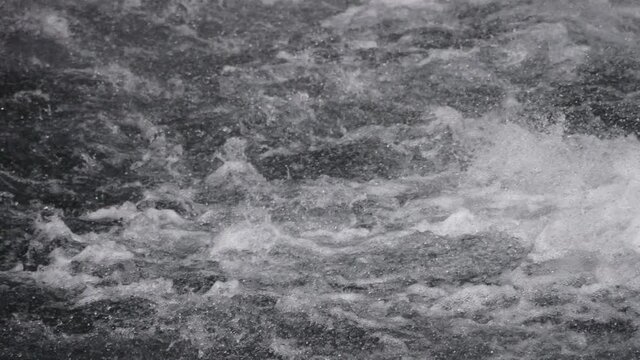 Close Up of Boiling Water with Steam and Water Splash Gushing Flow
