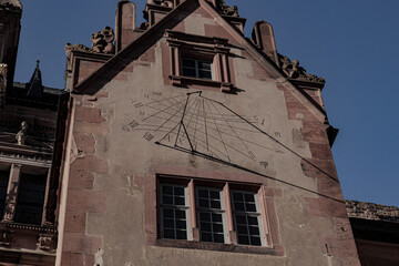 
Clock on the wall of Heidelberg Castle