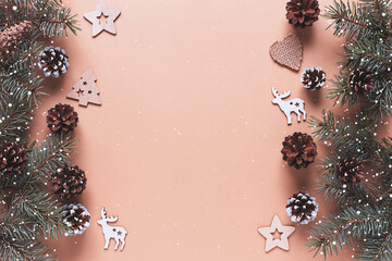 Christmas background with wooden decorations. Eco friendly, zero waste. New year's backdrop. Flat lay, top view. Copy space.