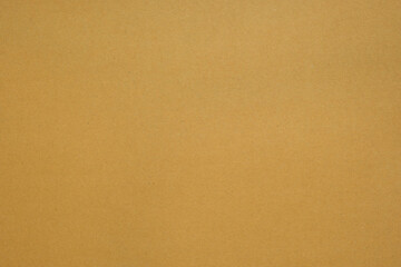 Texture of brown craft or kraft paper background, cardboard sheet, recycle paper, copy space for text.