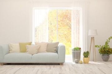 Stylish room in white color with sofa and autumn landscape in window. Scandinavian interior design. 3D illustration