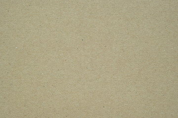 Texture of brown craft or kraft paper background, cardboard sheet, recycle paper, copy space for text.