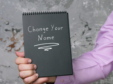 Motivational concept meaning Change Your Name with sign on the piece of paper.