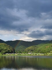 Fototapeta na wymiar lake and rainbow
