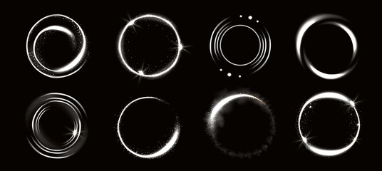 Light circles with sparkles, magic glow effect. Vector realistic set of white shiny rings and swirls, round frames of flare trail with glitter dust isolated on black background