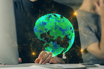 Media network theme hologram with man working on computer on background. Concept of internet...
