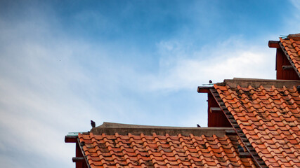 The old weathered temple roof needs to be repaired