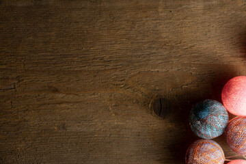 Round light cloth balls on a wood table