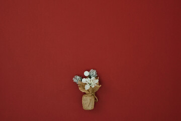 Christmas decor on a red background. Copy space, flat lay, mock up, top view