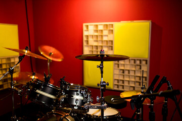 Fototapeta na wymiar red drums studio close-up in recording studio