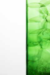 Bubbles in a green bottle on a white background