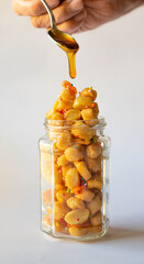 Homemade Sweet Italian Struffoli with Honey and Sprinkles