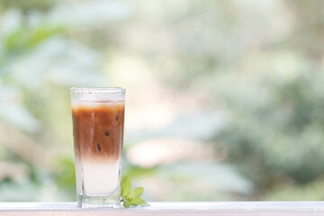 Iced coffee with milkshake, Summer refreshment drinks on wooden table background in coffee shop