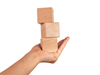 Wooden square cube in hand isolated on the white
