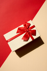 Presents with red ribbon on the bright background .,,