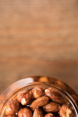 Almonds with honey in a glass jar