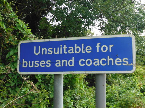 unsuitable for buses and coaches blue traffic sign