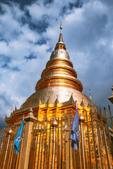 Naklejka premium Wat Phrathat Haripunchai Woramahawihan during Loy Khratong lantern festival in Lamphun, Chiang Mai, Thailand