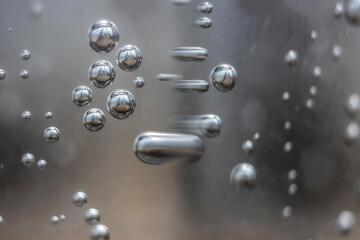 Metal Balls Floating and Transorming in Space