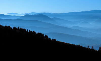 mountain panorama after sunset with blue hues
