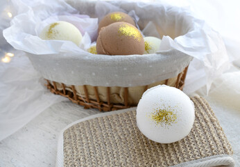 Spa concept with bath bombs and jute sponge on lights background. Aromatherapy and relax concept....