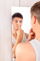 Young Man near the Mirror