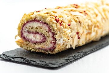Sweet roll with cream and sponge dough