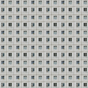 Seamless pattern from picture of a prefabricated concrete building facade with gray colors, a symbol of drab mass housing in anonymous condos and the urban city life