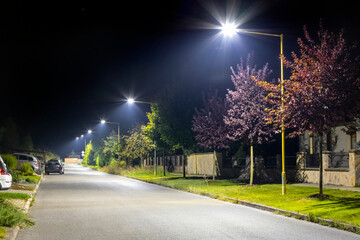 safe residential area with modern LED lighting at night - 395073418