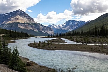 Breathtaking mountain and river landscape. Location place is Athabasca River in Jasper National park, Alberta,Canada